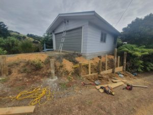 setting up the post and pouring concrete